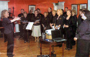 The Adare Trinity Choir performing at the Dunraven Arms Hotel on the Occasion of the launch of the choir's CD